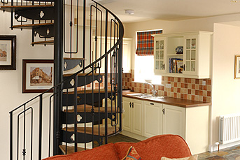 Spiral Staircase to TV Room